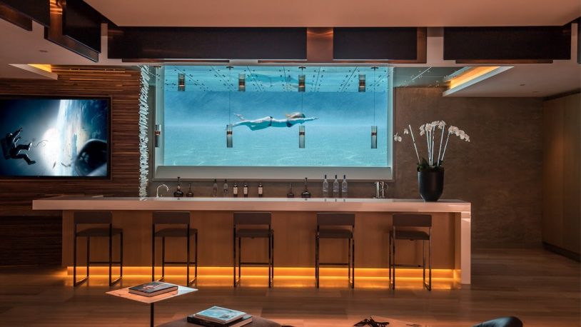 Read more about the article Check out this amazing home and Pool – And the Wine Rack!!